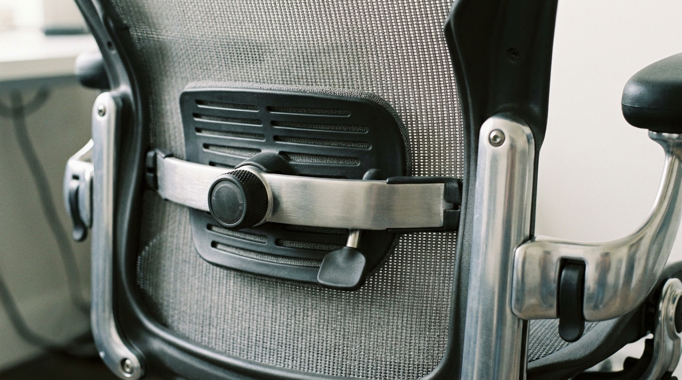Close up of adjustable lumbar support on a premium mesh office chair